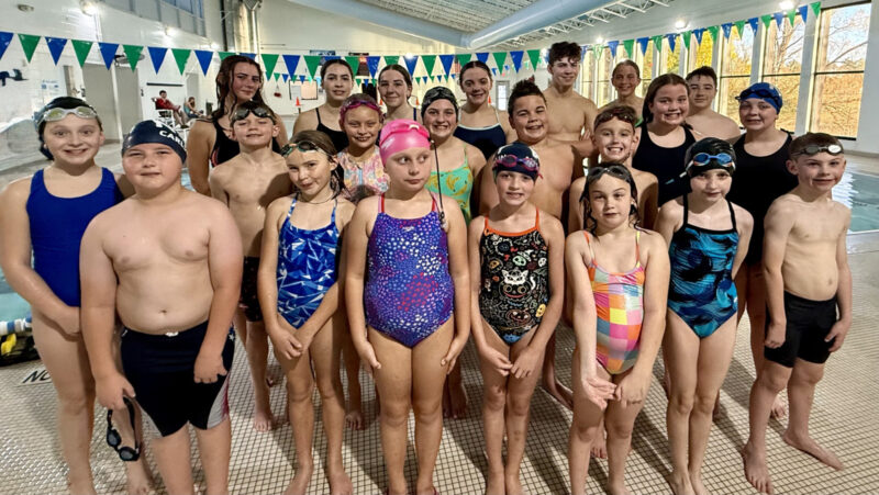YMCA swimmers place 1st at Marquette meet